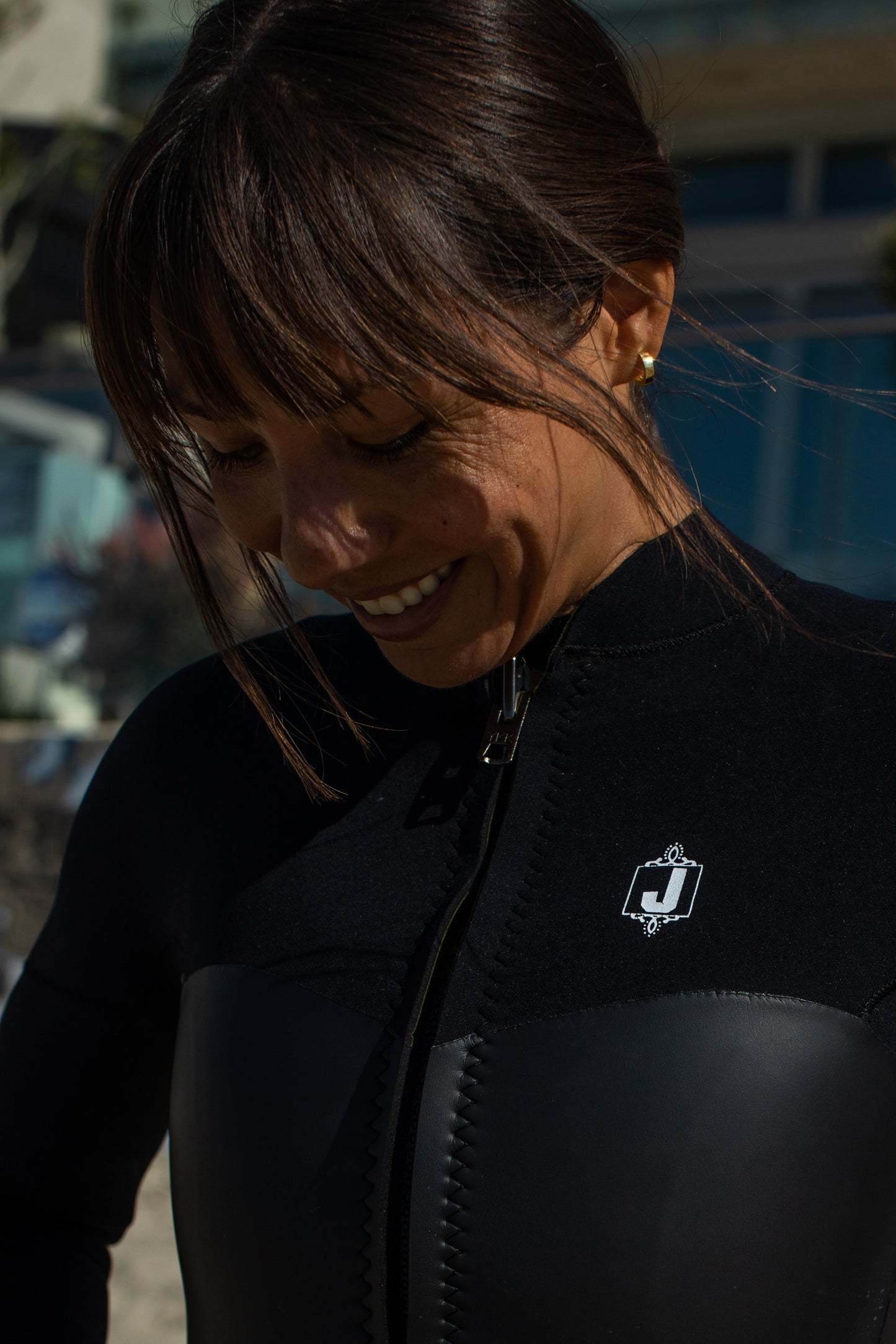 Premium black wetsuit with Yamamoto limestone-based material - handcrafted custom wetsuits.