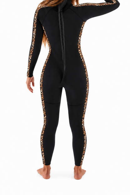 Back view of a model wearing the Jonesea Cheetahlicious Signature Fullsuit in black, showing the back zipper and cheetah-print panels along the sleeves and sides.