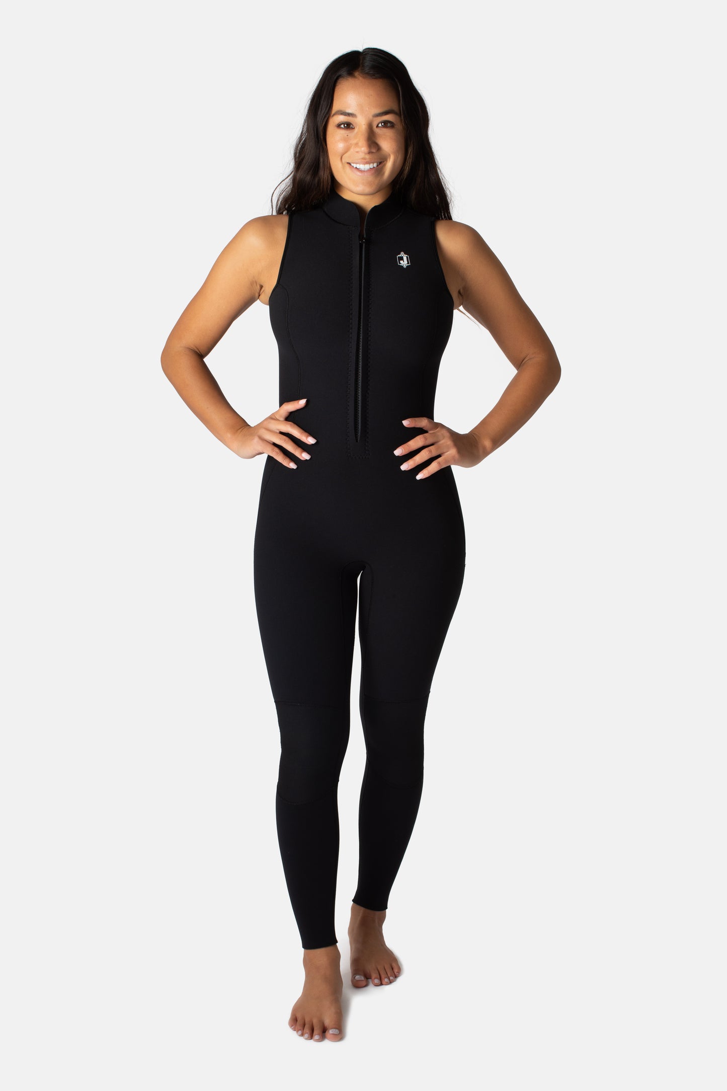 Jonesea Black High-Neck Betty Jane Springsuit – Front view of handmade women's neoprene wetsuit in Black, hands on hips, white background
