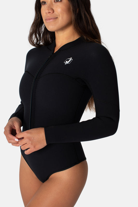 Jonesea Black La Cheeky Springsuit – Side view of handmade women's neoprene wetsuit in Black, long sleeve, front zip, white background
